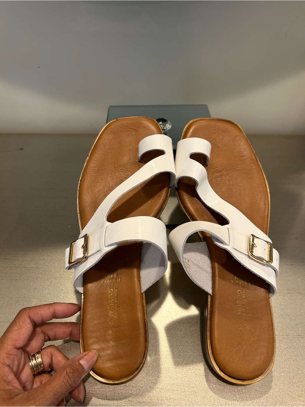 Sophia Milano Women's White Slide Sandals with Gold Buckle Accent
